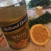 Add white wine and lemon juice to pan