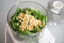 Basil with pine nuts in food processor